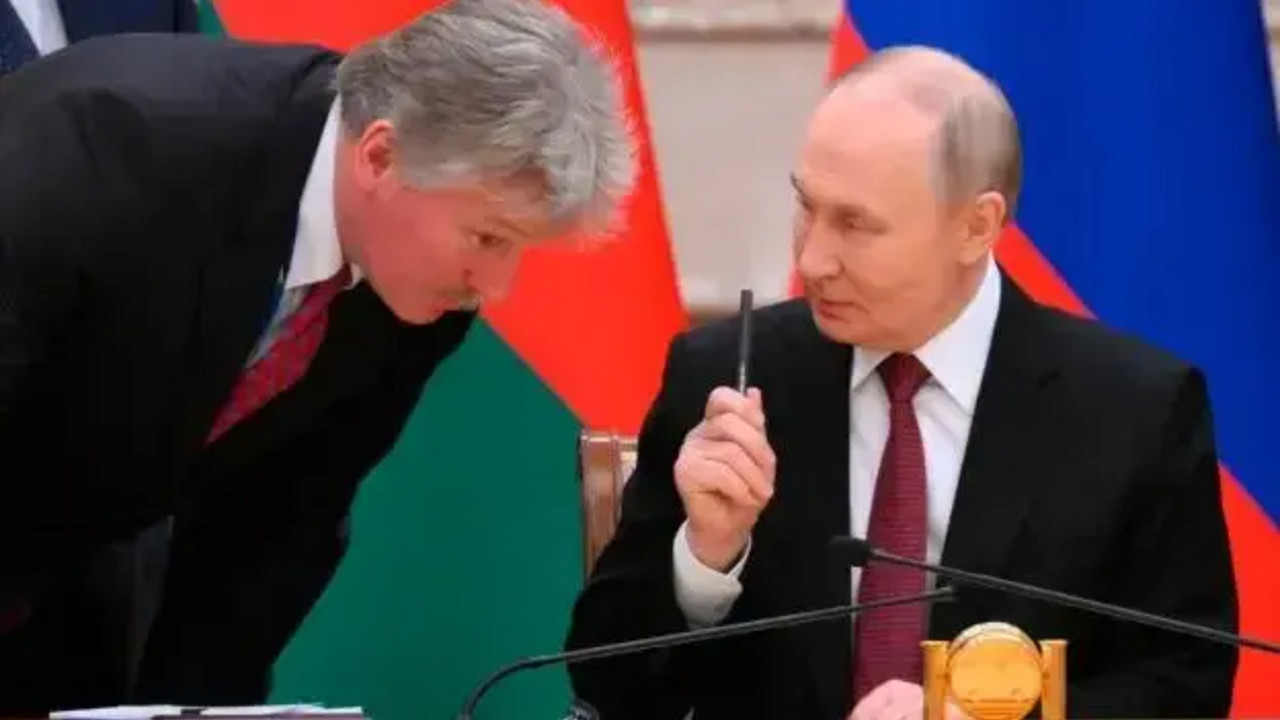 Dmitrij Peskov i Vladimir Putin