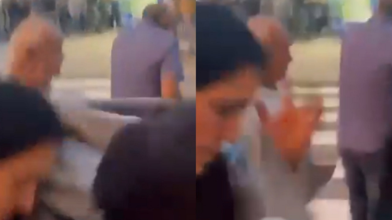 Trenutak kada je žena pogođena kamenom