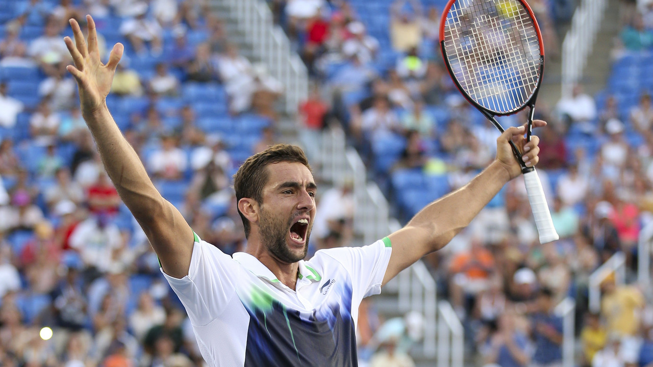 Marin Čilić slavi pobedu protiv Žila Simona u osmini finala US Opena