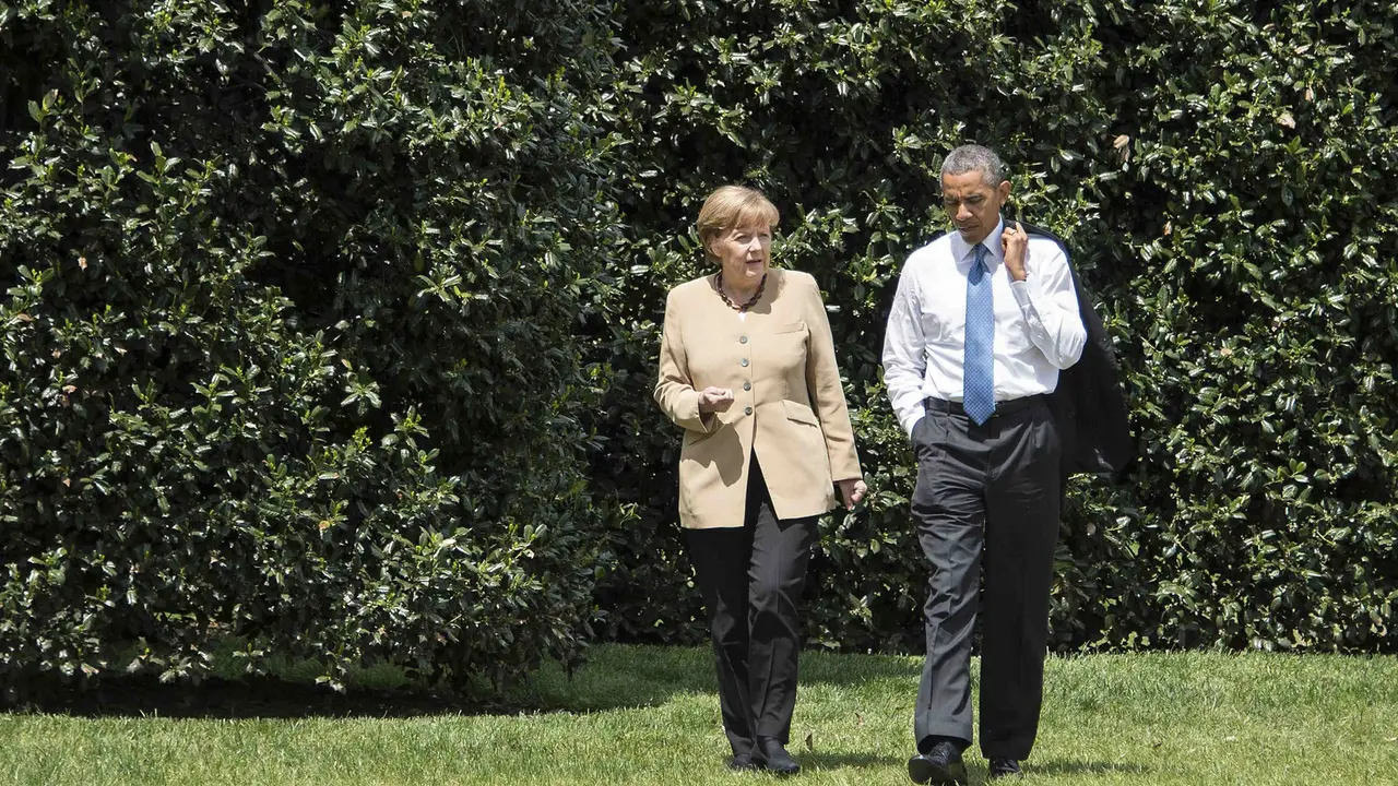 Angela Merkel i Obama šetaju