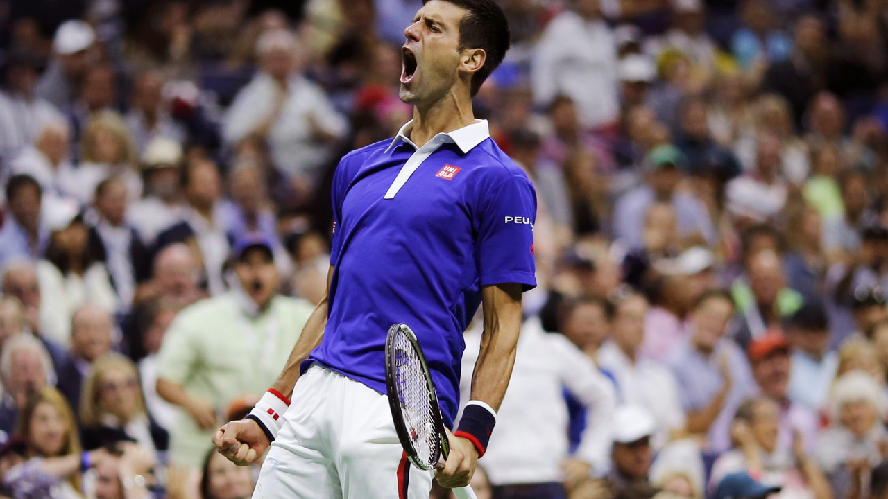 Novak Đoković proslavlja poen u finalu US opena protiv Rodžera Federera