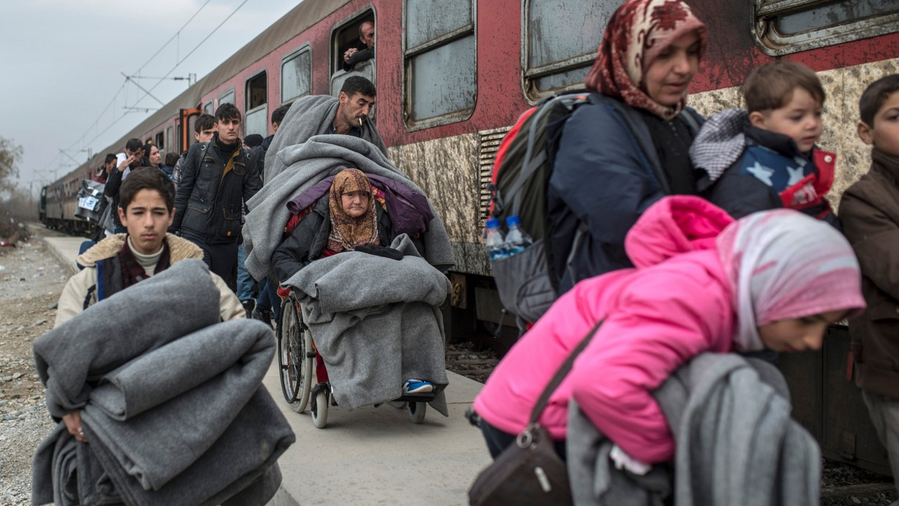 Migranti u vozu