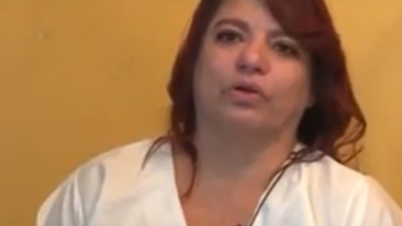 žena