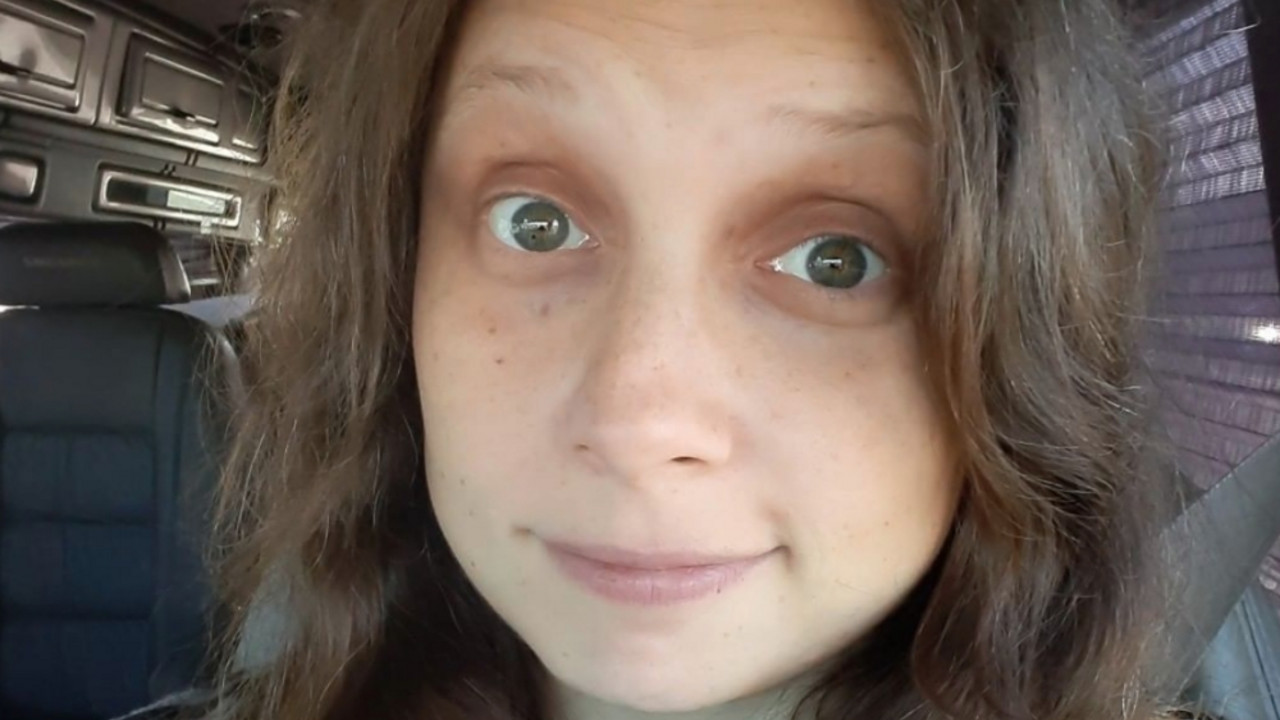 žena
