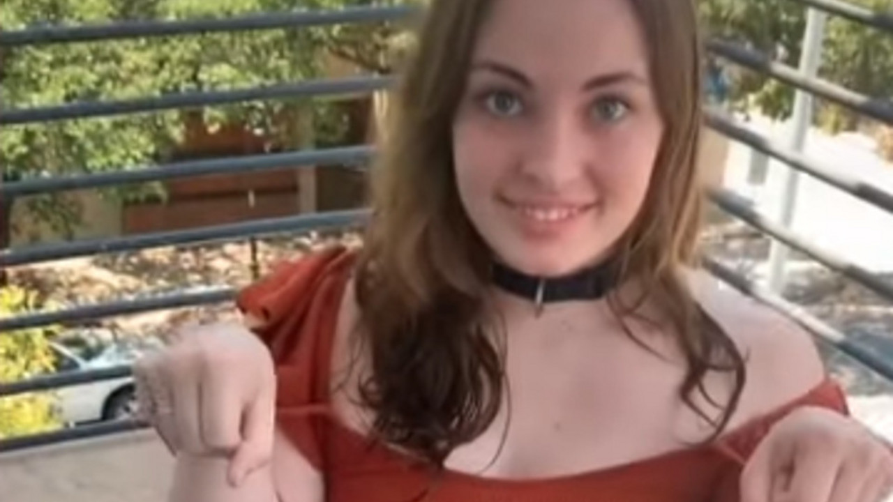 žena