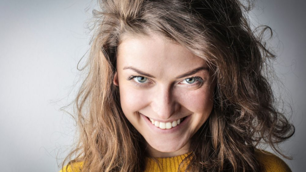 žena