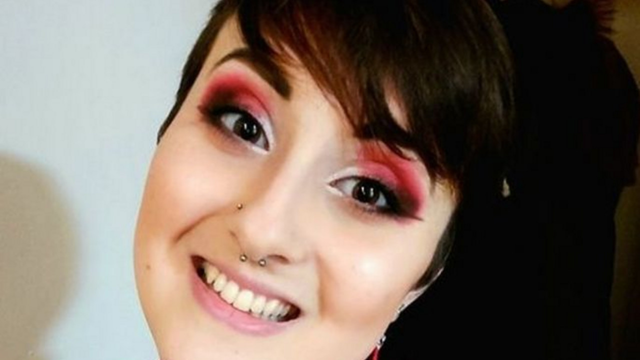 žena